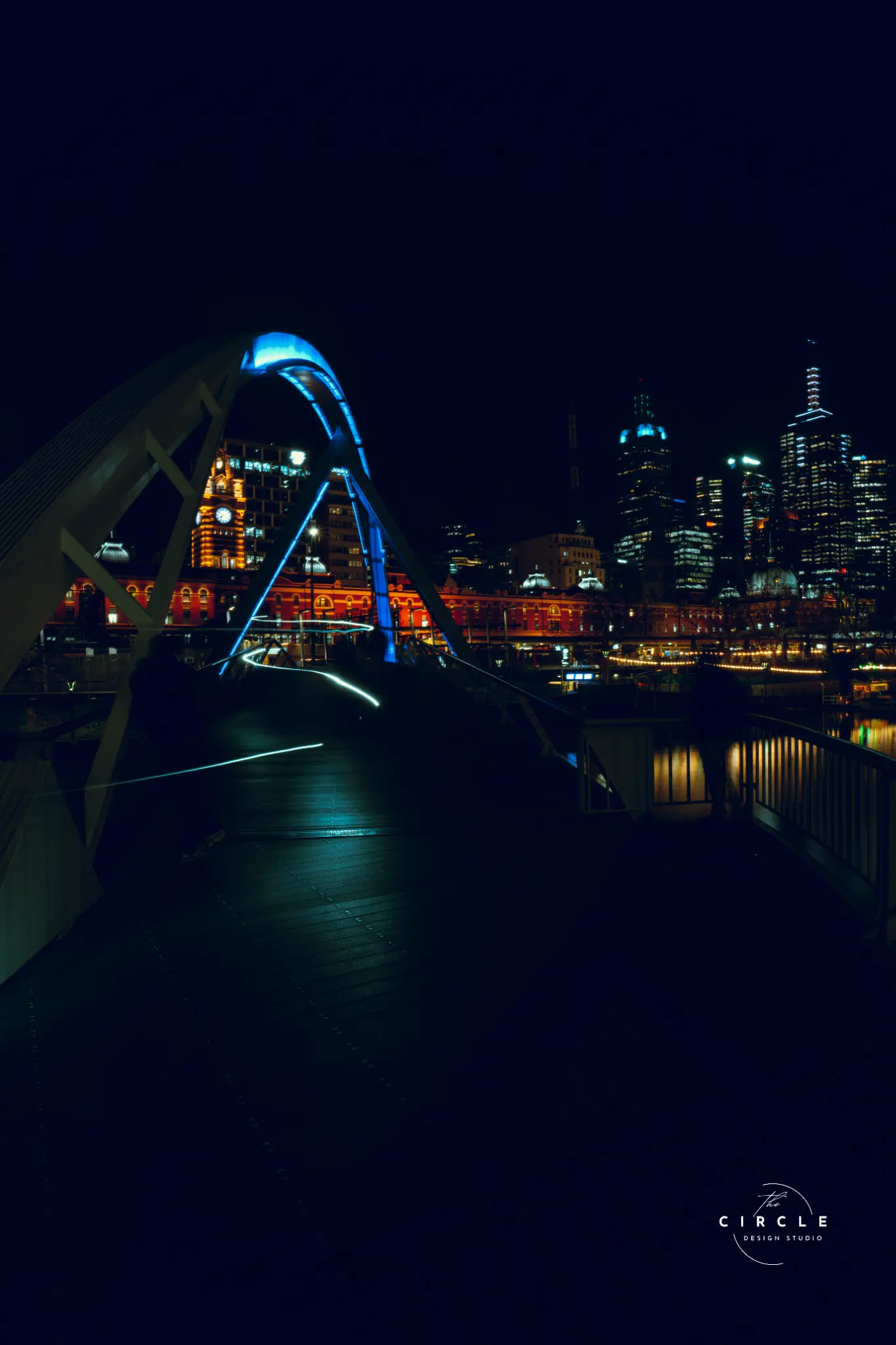 Melbourne city lights and bridge at night photographed by The Circle Studio