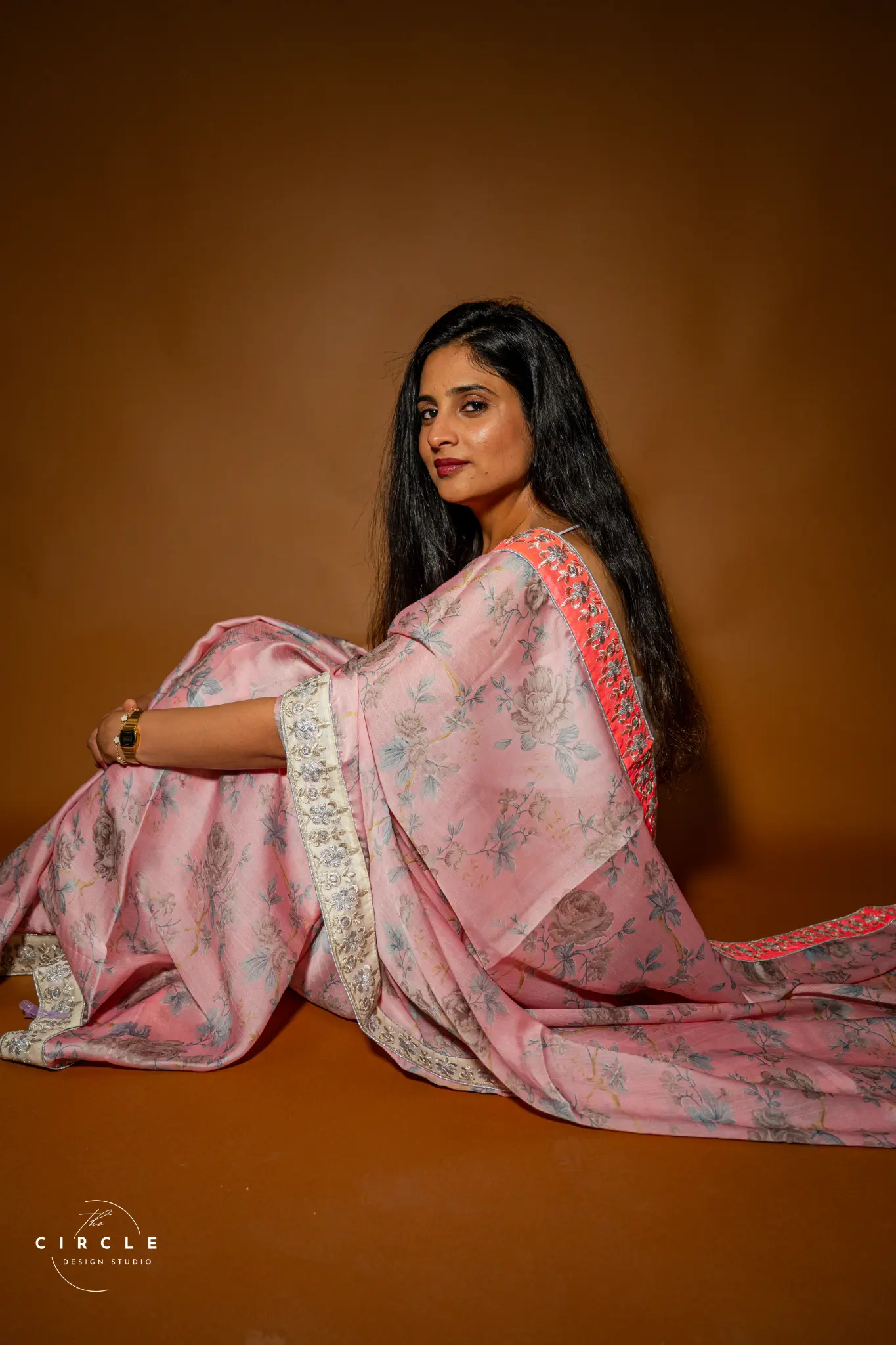 Editorial portrait in a pink sari photographed by The Circle Studio